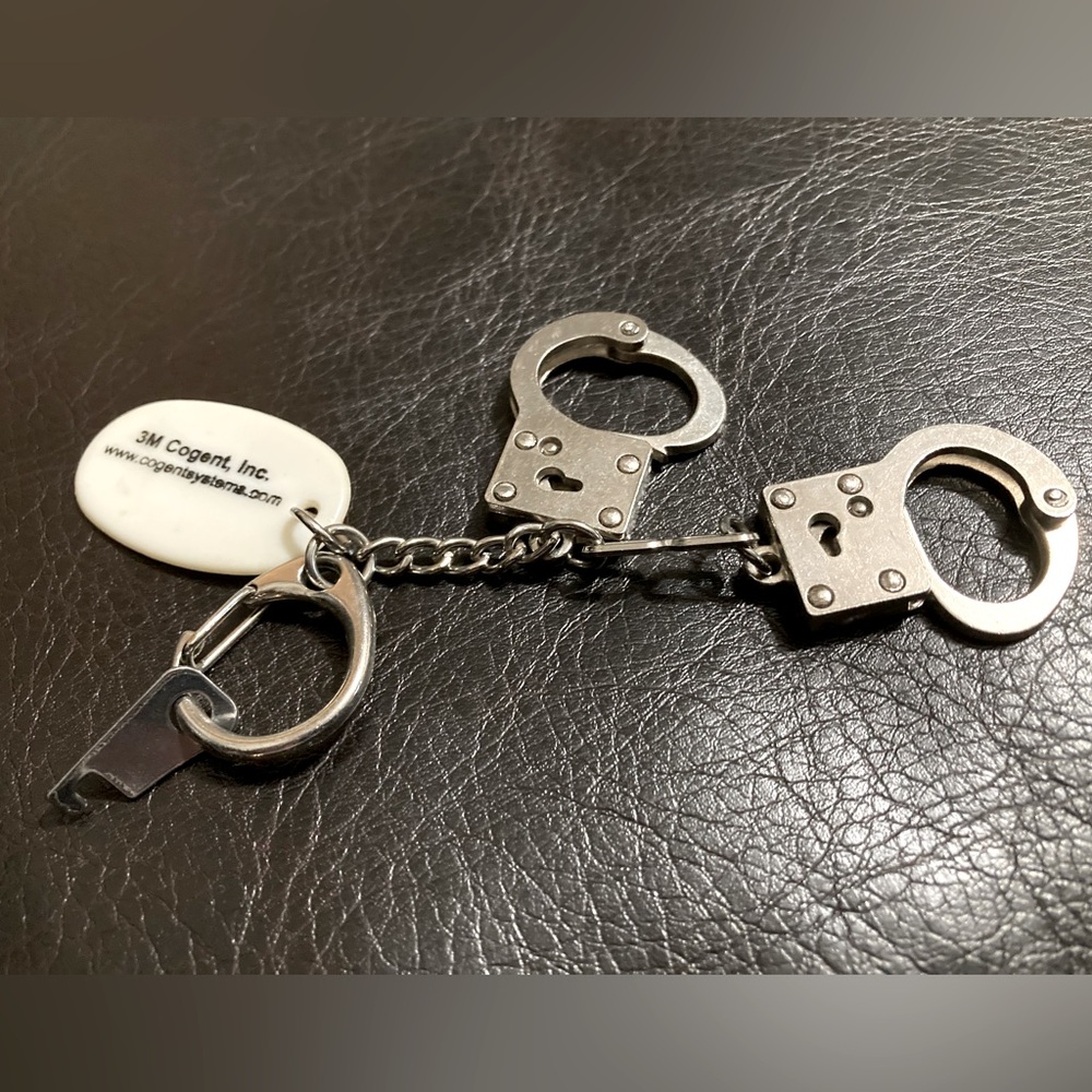 Keychain with tiny, working handcuffs and key.